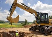 Аренда колесного экскаватора CAT M322D2 в Москве и МО
